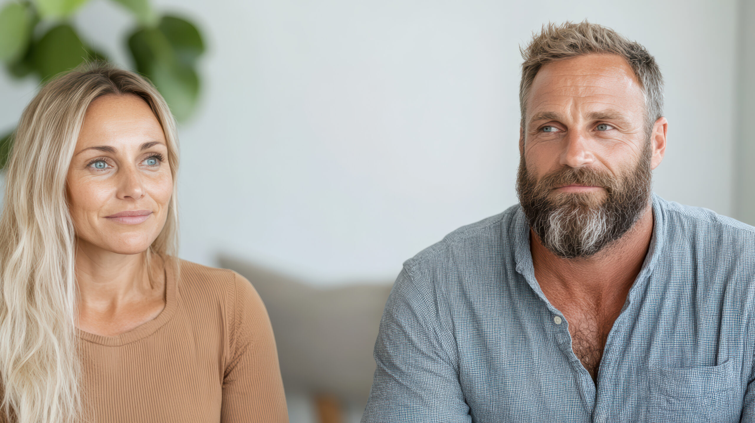 Couples therapy in Aurora — a couple sitting together, supported by an Aurora couples therapist at Aurora Village Therapy